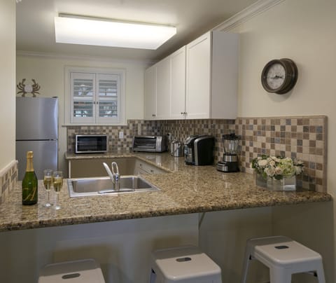 Fridge, coffee/tea maker, cookware/dishes/utensils