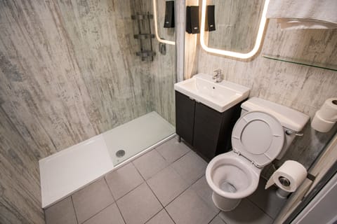 Shower, free toiletries, hair dryer, towels