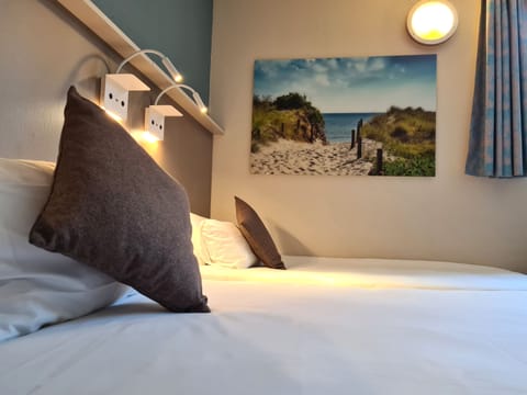 Premium bedding, desk, soundproofing, iron/ironing board