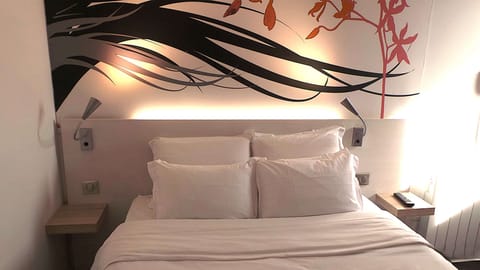 Premium bedding, desk, laptop workspace, blackout drapes