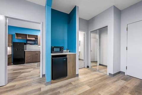 Suite, Multiple Beds, Non Smoking | Desk, blackout drapes, iron/ironing board, free WiFi