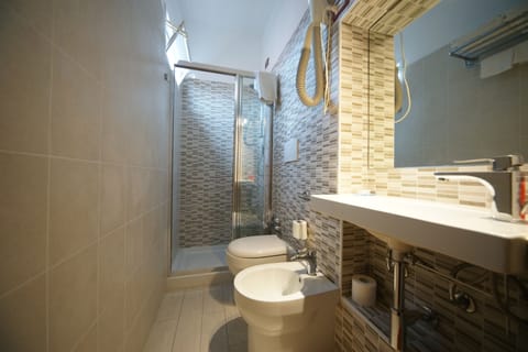 Double or Twin Room, Sea View | Bathroom | Shower, hair dryer, bidet, towels