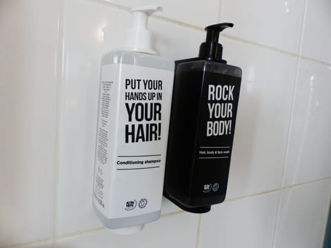 Shower, eco-friendly toiletries, hair dryer, towels