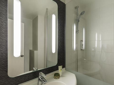 Shower, eco-friendly toiletries, hair dryer, towels