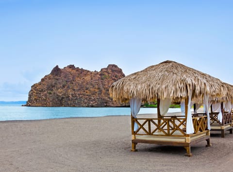 On the beach, sun loungers, beach umbrellas, beach massages