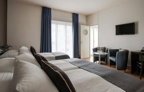 Triple Room, Balcony, River View | In-room safe, desk, iron/ironing board, free cribs/infant beds