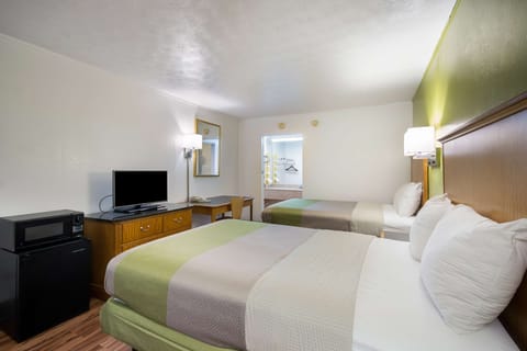 Desk, free WiFi, bed sheets, alarm clocks