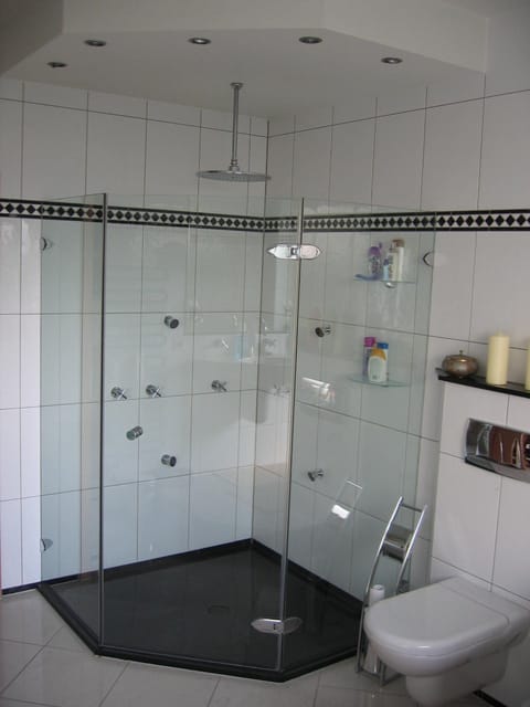 Quadruple Room | Bathroom | Shower, designer toiletries, hair dryer, towels
