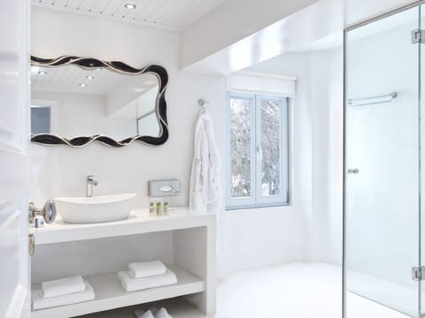 Suite, Sea View | Bathroom | Shower, free toiletries, hair dryer, slippers