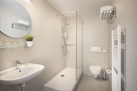 Hair dryer, towels, soap, shampoo