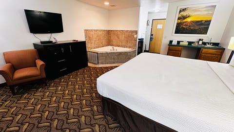 Standard Room, 1 King Bed | Desk, iron/ironing board, free cribs/infant beds, rollaway beds