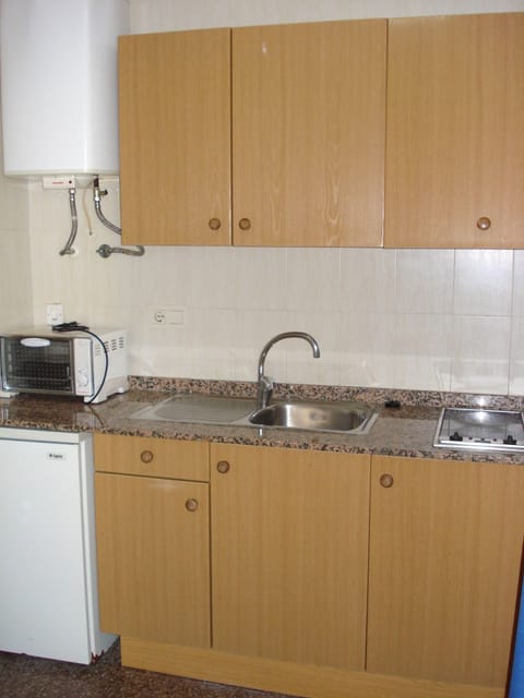 Standard Apartment, 1 Bedroom | Private kitchen | Fridge, microwave, stovetop, coffee/tea maker