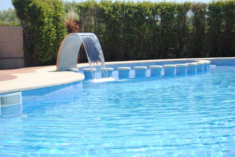 Outdoor pool, open 10:00 AM to 8:00 PM, pool umbrellas, sun loungers