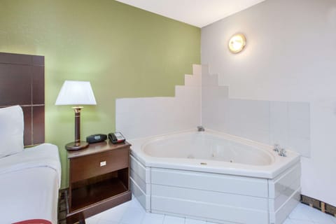 Suite, 1 King Bed, Non Smoking (One-Bedroom) | Desk, laptop workspace, rollaway beds, free WiFi