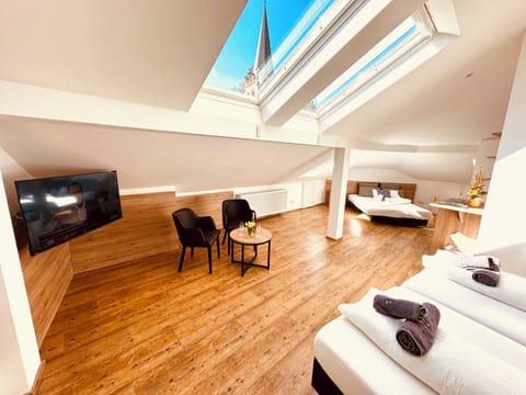 Attic Triple Room | Hypo-allergenic bedding, minibar, in-room safe, desk