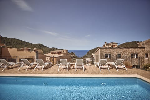 Indoor pool, outdoor pool, pool umbrellas, sun loungers