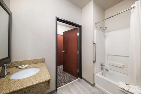 Suite, 2 Queen Beds, Accessible, Refrigerator & Microwave (with Sofabed) | Bathroom | Free toiletries, hair dryer, towels