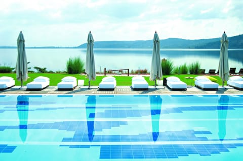 Outdoor pool, open 10:00 AM to 10:00 PM, pool umbrellas, sun loungers