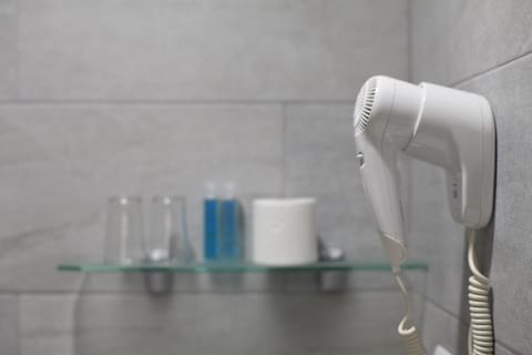 Shower, free toiletries, hair dryer, towels