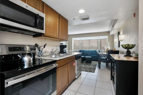 Microwave, coffee/tea maker, cookware/dishes/utensils