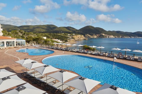 2 outdoor pools, pool umbrellas, sun loungers