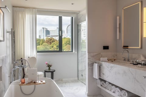 Apartment, 1 King Bed (Separate living area) | Bathroom | Deep soaking tub, rainfall showerhead, designer toiletries, hair dryer