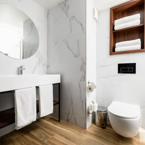 Superior Studio | Bathroom | Eco-friendly toiletries, towels, soap, shampoo