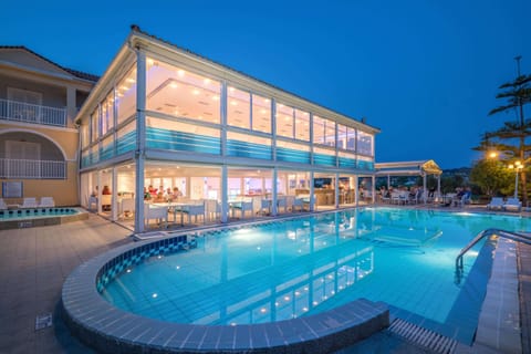 Seasonal outdoor pool, open 10:00 AM to 6:00 PM, pool umbrellas