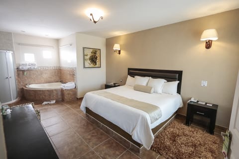 Premier Suite, 1 Bedroom, Jetted Tub | 1 bedroom, in-room safe, desk, cribs/infant beds