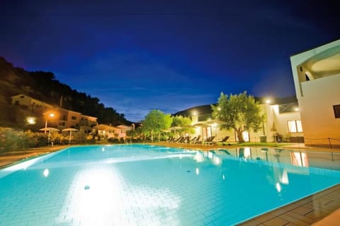 Outdoor pool, a rooftop pool, open 9:00 AM to 8:00 PM, pool umbrellas