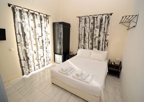 Double or Twin Room | Blackout drapes, iron/ironing board, free WiFi, bed sheets