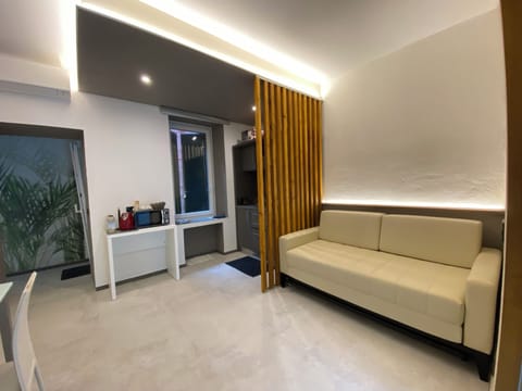 Ca' Marilu' | Living area | 30-inch flat-screen TV with cable channels