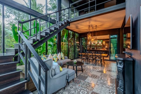 Exclusive Villa, 4 Bedrooms, Garden View, Garden Area | Living area | 32-inch LED TV with cable channels, TV