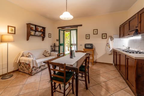 Apartment, 1 Bedroom (Olivo C) | Private kitchen | Full-size fridge, stovetop, electric kettle, highchair