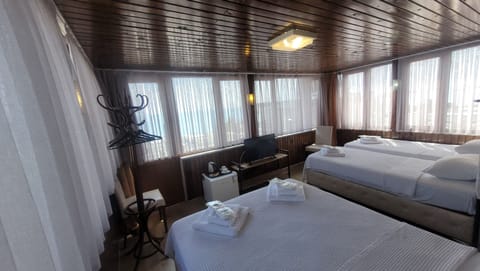 Panaromik Uc Kisilik Oda, Deniz Manzarali (450) | Egyptian cotton sheets, premium bedding, Select Comfort beds, minibar
