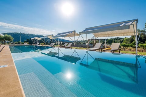 Indoor pool, 3 outdoor pools, pool umbrellas, sun loungers
