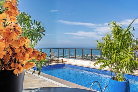 Outdoor pool, open 10 AM to 10 PM, sun loungers