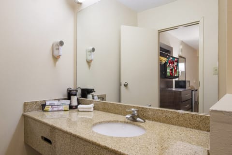 Superior Room, 1 King Bed, Non Smoking | Bathroom | Combined shower/tub, deep soaking tub, free toiletries, towels