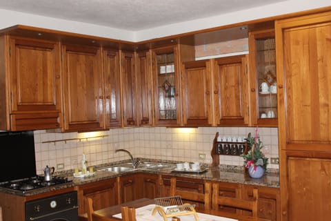 Apartment, 2 Bedrooms | Private kitchen | Full-size fridge, oven, stovetop, electric kettle