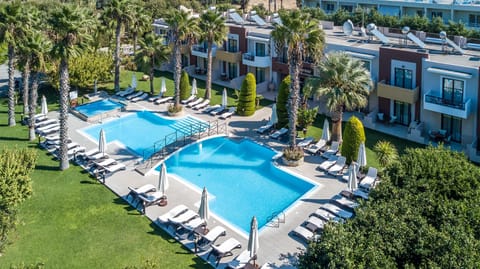 Seasonal outdoor pool, open 9 AM to 7 PM, pool umbrellas, sun loungers