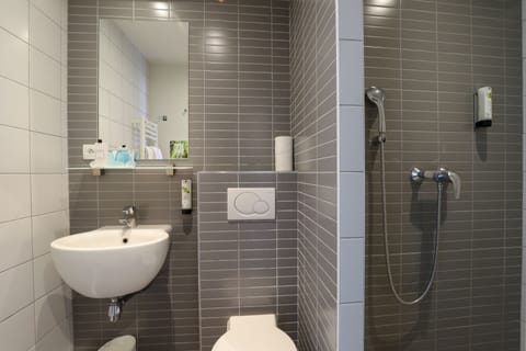 Family Triple Room | Bathroom | Combined shower/tub, free toiletries, hair dryer, towels