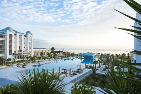 Indoor pool, outdoor pool, pool umbrellas, sun loungers
