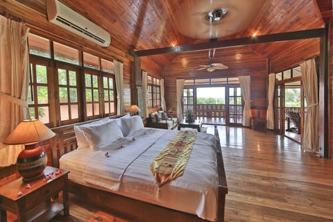 4 Bedrooms Pool Villa, Partial Sea View | 4 bedrooms, minibar, in-room safe, desk
