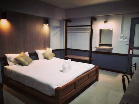 Desk, blackout drapes, rollaway beds (surcharge), WiFi (free)