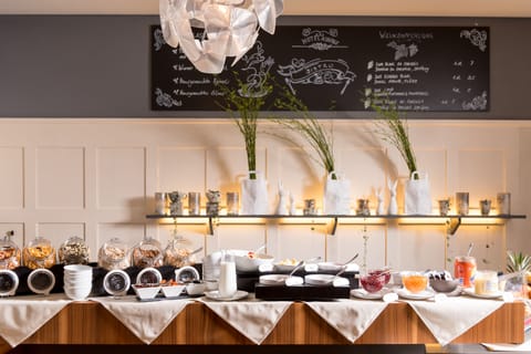 Daily buffet breakfast (CHF 18 per person)