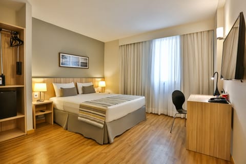 Triple Room, Accessible, Non Smoking | Minibar, in-room safe, desk, laptop workspace