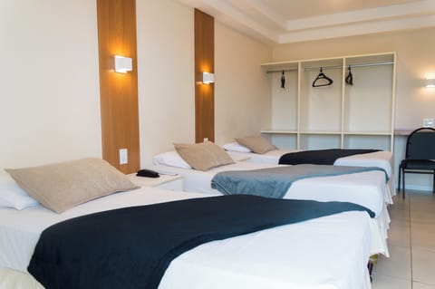 Standard Triple Room | Minibar, desk, blackout drapes, free WiFi