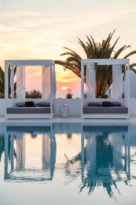 Seasonal outdoor pool, open 11:00 AM to 8:00 PM, free cabanas