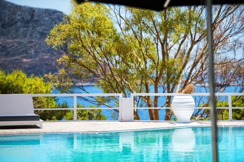 Seasonal outdoor pool, pool umbrellas, sun loungers