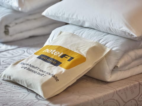 Blackout drapes, free WiFi, bed sheets